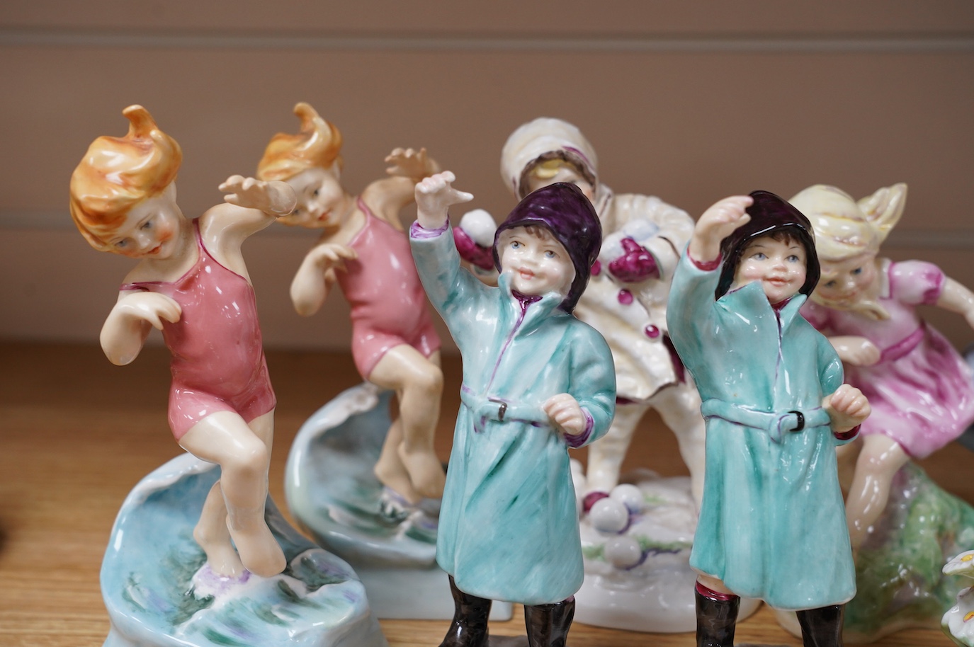 Ten Worcester F G Doughty Months series figures including 3440 & 3453, largest 18cm high. Condition - good